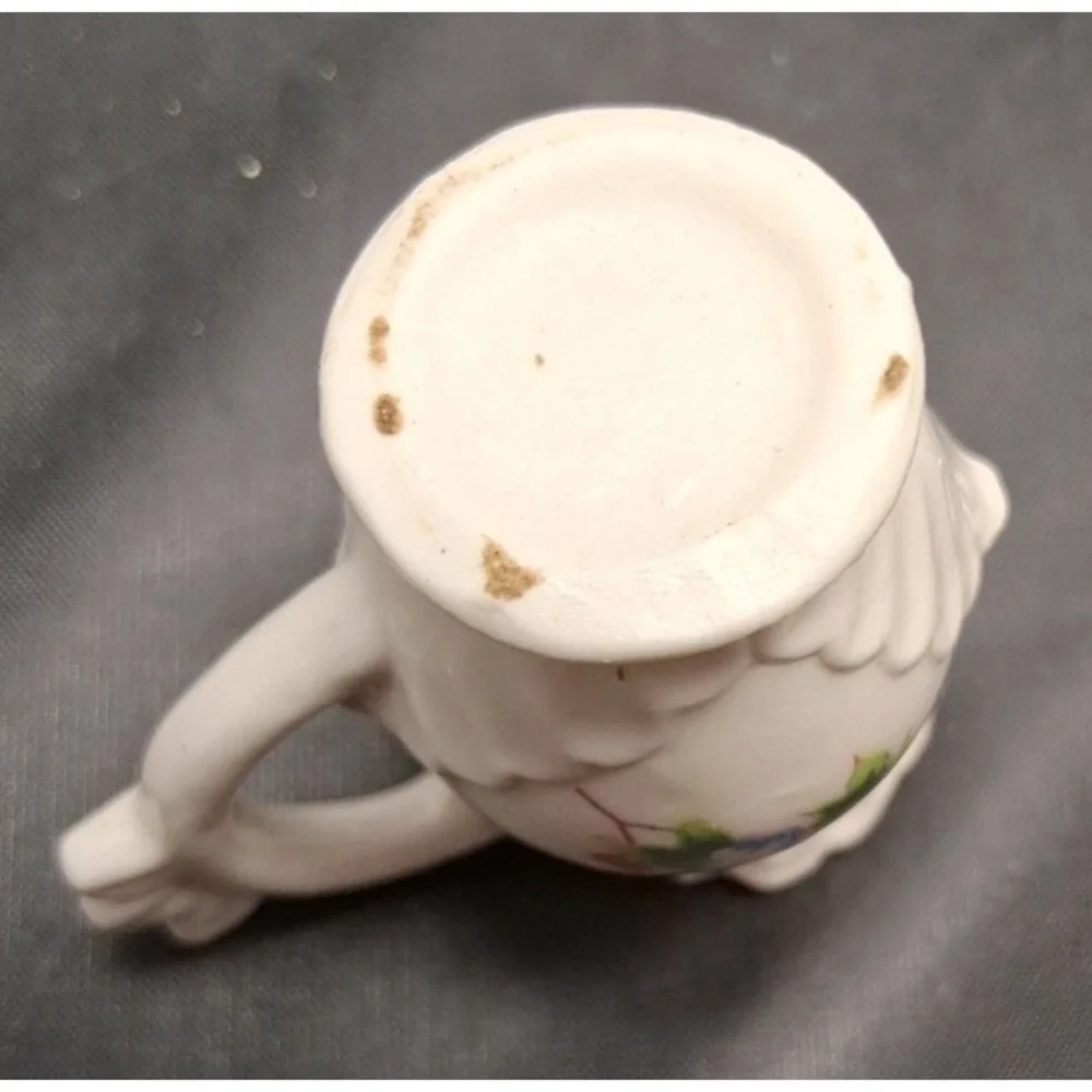 Collection of Seven Vintage Miniature Ceramic Bud Vases with Hand-Painted Design
